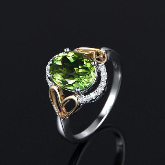 Oval Peridot Diamond Heart Engagement Ring in Two-Tone Gold