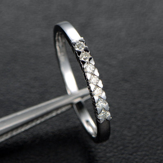 7-Stone Moissanite Heart Shared Prongs Wedding Band