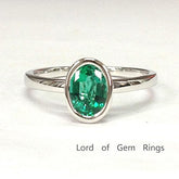 Bezel-Set Oval Emerald Solitaire Ring 14K White Gold - Lord of Gem Rings