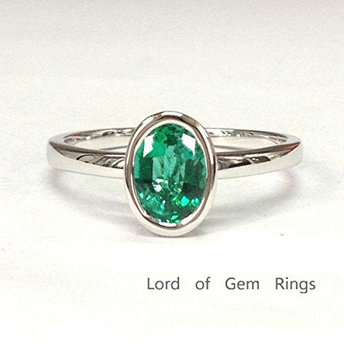 Bezel-Set Oval Emerald Solitaire Ring 14K White Gold