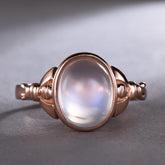 Bezel-Set Oval Moonstone Solitaire Bow Ring 14k Rose Gold - Lord of Gem Rings
