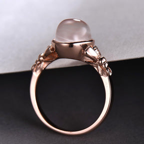 Bezel-Set Oval Moonstone Solitaire Bow Ring 14k Rose Gold - Lord of Gem Rings