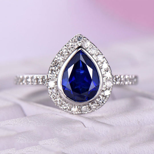 Bezel-Set Pear Sapphire Diamond Halo Engagement Ring 14K White Gold