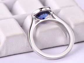 Bezel-Set Round VVS Tanzanite Solitaire Ring 14K White Gold - Lord of Gem Rings