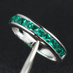 Channel-Set Princess Emerald Half Eternity May Birthstone Band - Lord of Gem Rings