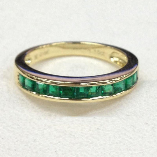 Channel-Set Princess Emerald Half Eternity May Birthstone Band