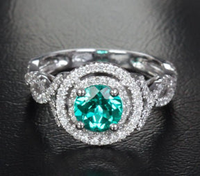 Double Halo Round Emerald Criss Cross Engagement Ring Diamond Accents - Lord of Gem Rings