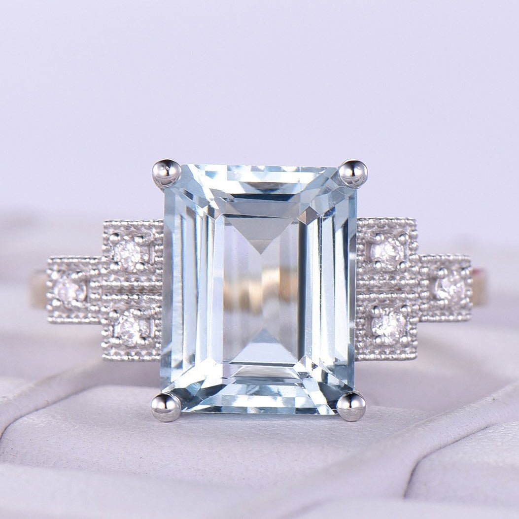 Emerald Cut Aquamarine Triple Diamond Milgrain Square Shank in Two Tone Gold - Lord of Gem Rings