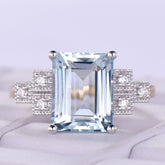 Emerald Cut Aquamarine Triple Diamond Milgrain Square Shank in Two Tone Gold - Lord of Gem Rings