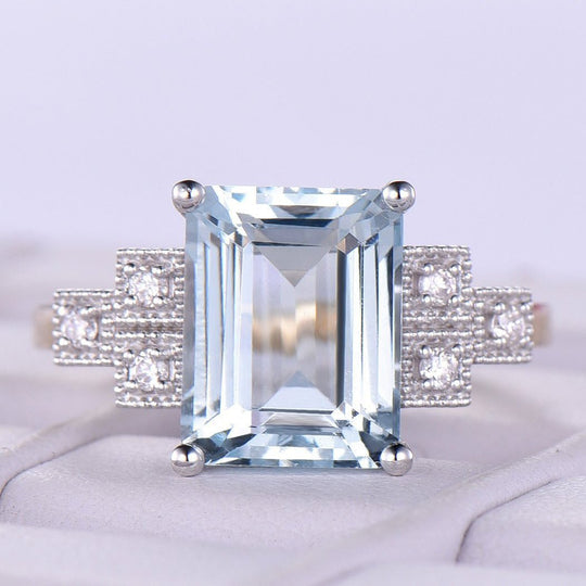 Emerald Cut Aquamarine Triple Diamond Milgrain Square Shank in Two Tone Gold