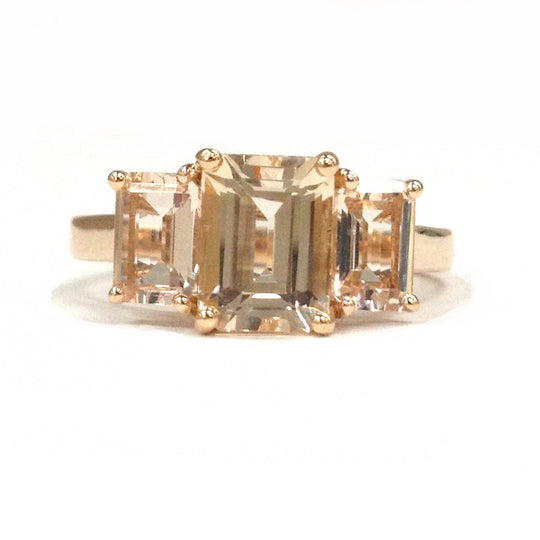 Emerald Cut Morganite Three-Stone Trellis Engagement Ring