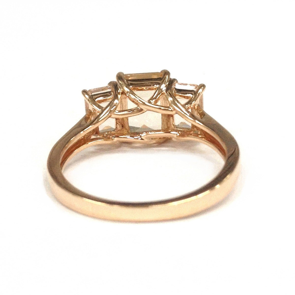 Emerald Cut Morganite Three-Stone Trellis Engagement Ring - Lord of Gem Rings