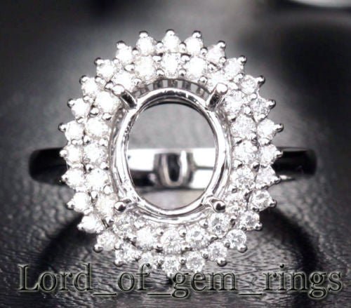 Flower 8x10mm Oval 14K White Gold .85CT Diamond Halo Setting