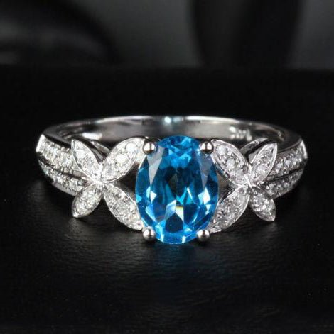 Oval Blue Topaz Diamond Butterfly Engagement Ring 14K White Gold