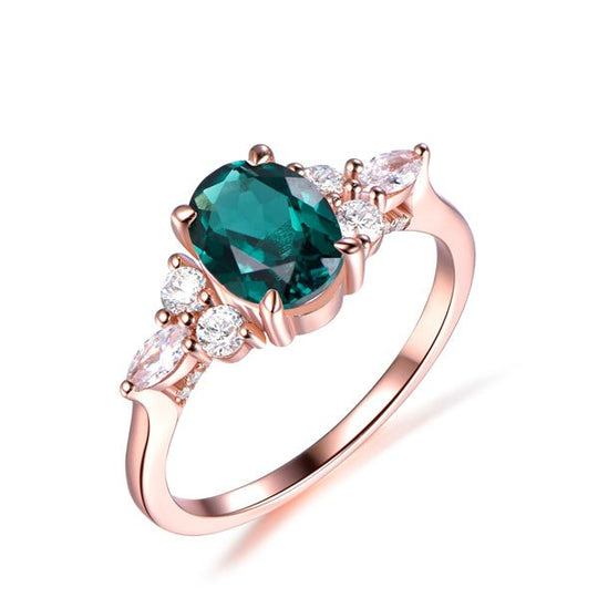 Oval Emerald Triple Diamond Accents Engagement Ring