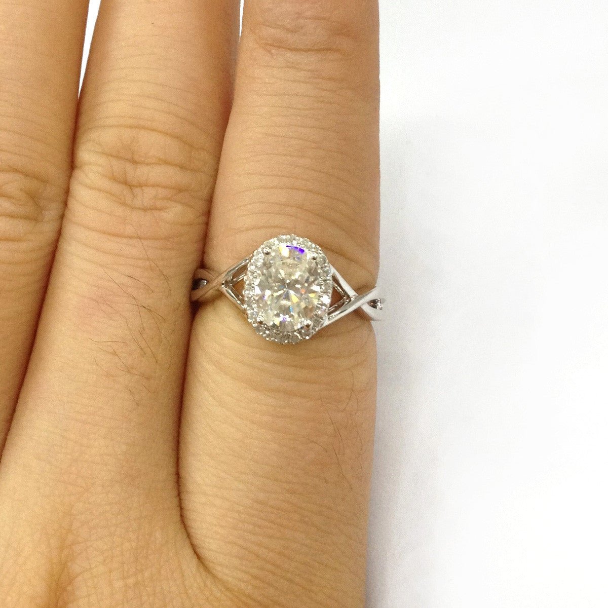 Oval Moissanite Crossover Ring with Diamond Halo - Lord of Gem Rings