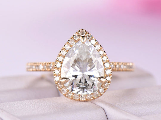 Pear Moissanite With Diamond Accents in Yellow Gold