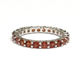 Prong - Set Garnet Full Eternity January Birthstone Band - Lord of Gem Rings