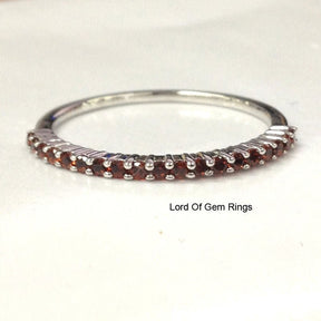 Prong - Set Garnet Half Eternity January Birthstone Band - Lord of Gem Rings
