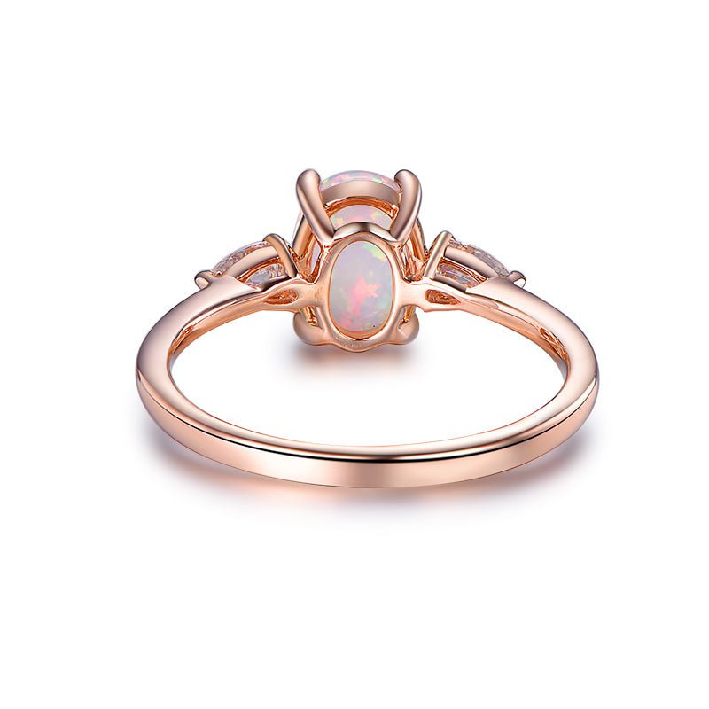 Three-Stone Oval Africa Opal Pear Moissanite Engagement Ring - Lord of Gem Rings