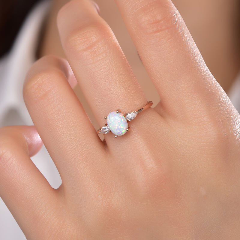 Three-Stone Oval Africa Opal Pear Moissanite Engagement Ring - Lord of Gem Rings
