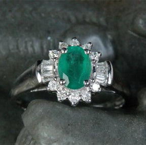Princess Diana Oval Emerald Baguette Diamond Engagement Ring